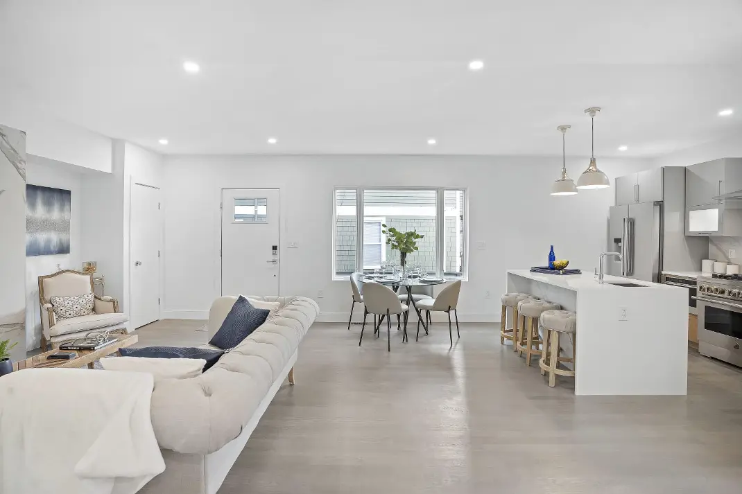 Efficient, Elegant and Functional Design, by Paulo Santos Modern Living Room and Kitchen with Light Wood floors and furnitures, Designed by Paulo Santos